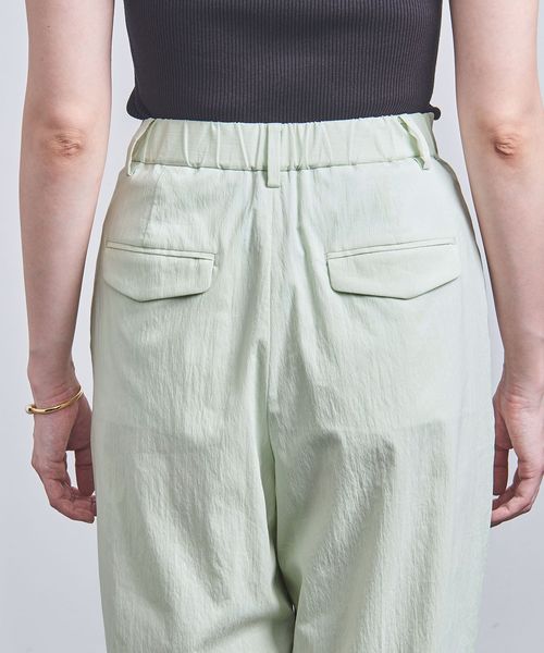 美品◯ユナイテッドアローズ　TA/P タックテーパードパンツ　ライム UNITED ARROWS - UNITED ARROWS TA/P タック テーパード パンツ