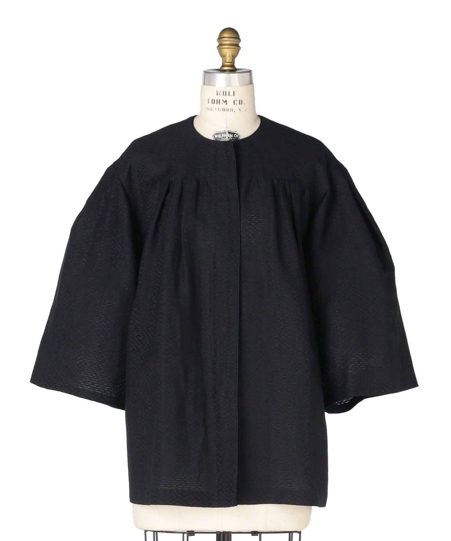 SPRING ウェーブノーカラーコート