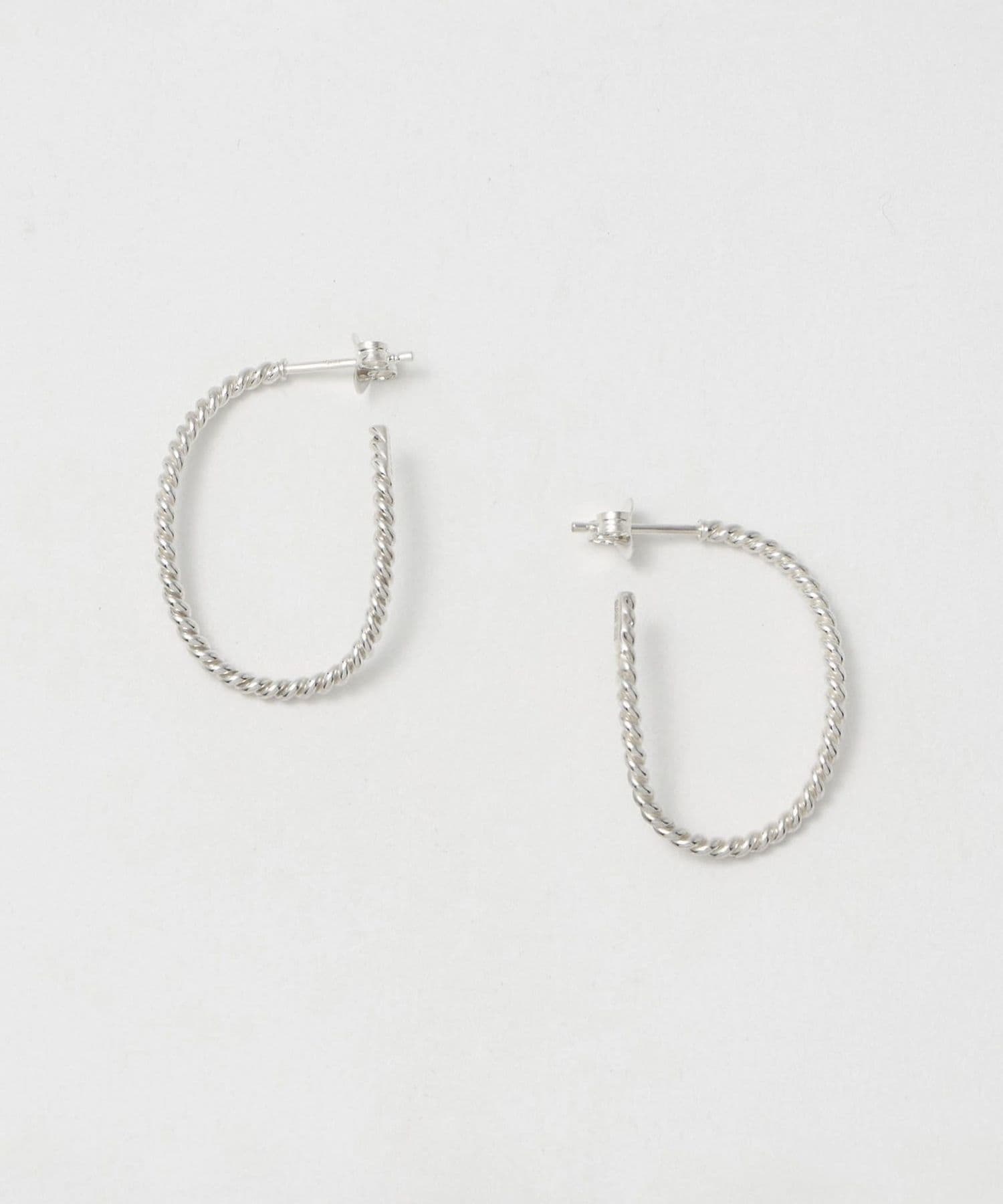 ★パリ発 Rouje★BELISSIMA ツイスト クレオール ピアス SILVER BAR JEWELLERY> TWISTED ELONGATED HOOP EARRINGS SILVER COLOR