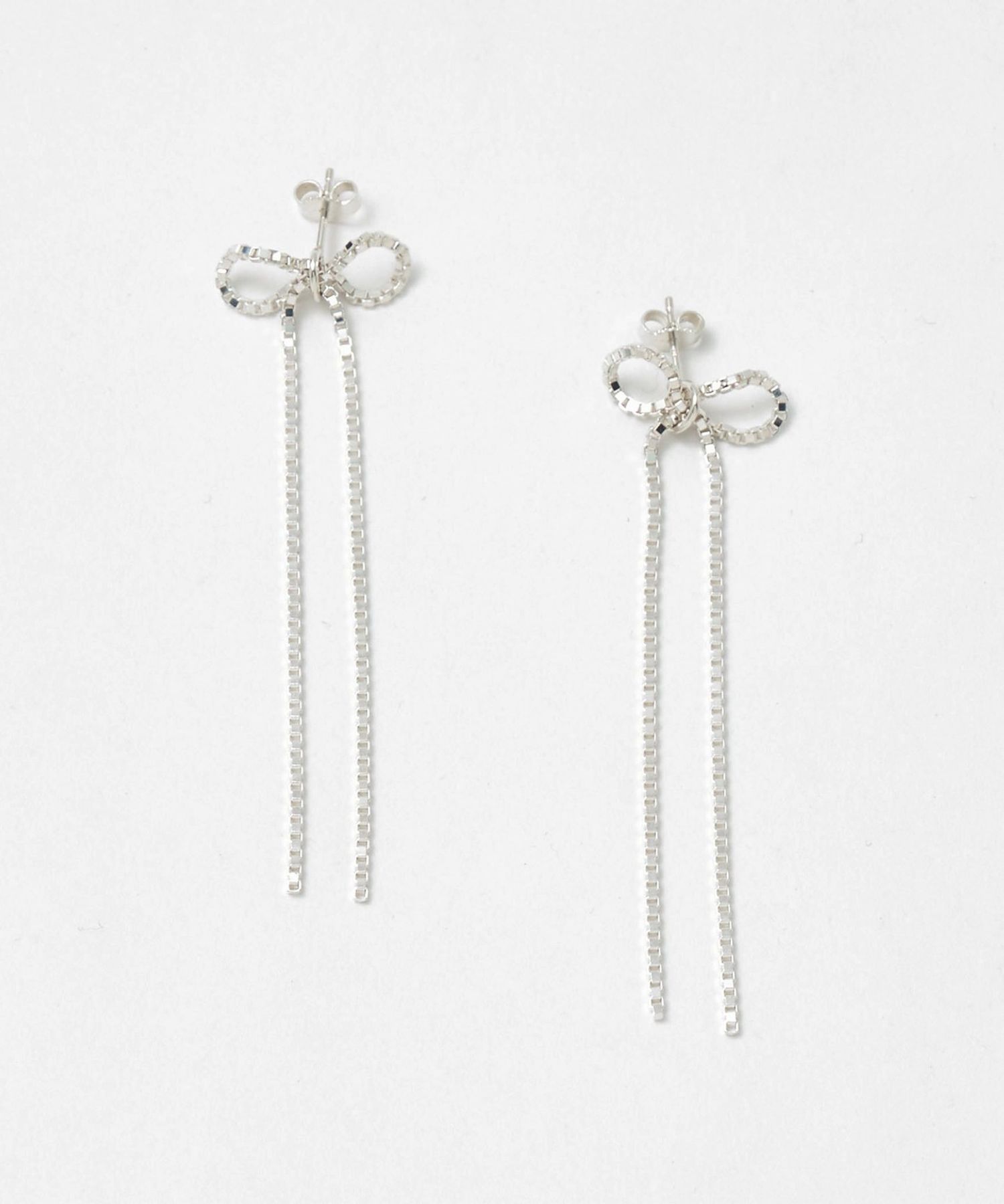 SASKIA DIEZ＞BOW EARRINGS SILVER/ピアス